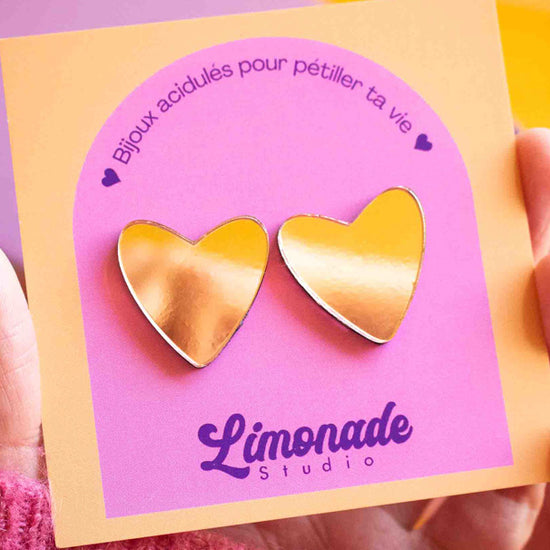 vidéo boucles d'oreille cœur rose gold miroir portées et à la lumière, Limonade Studio