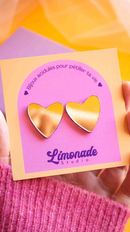 vidéo boucles d'oreille cœur rose gold miroir portées et à la lumière, Limonade Studio